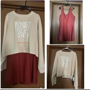 Cream Graphic Sweatshirt and orange athletic dress set.